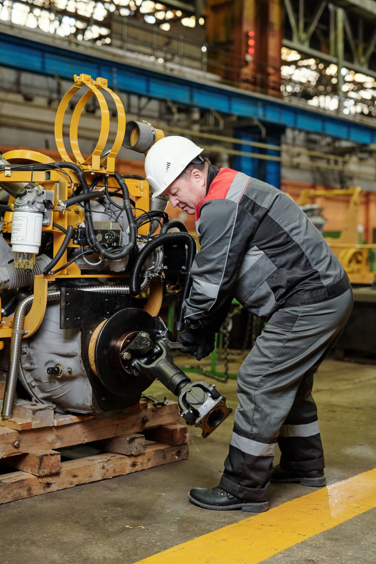 Engineer working with metal equipment