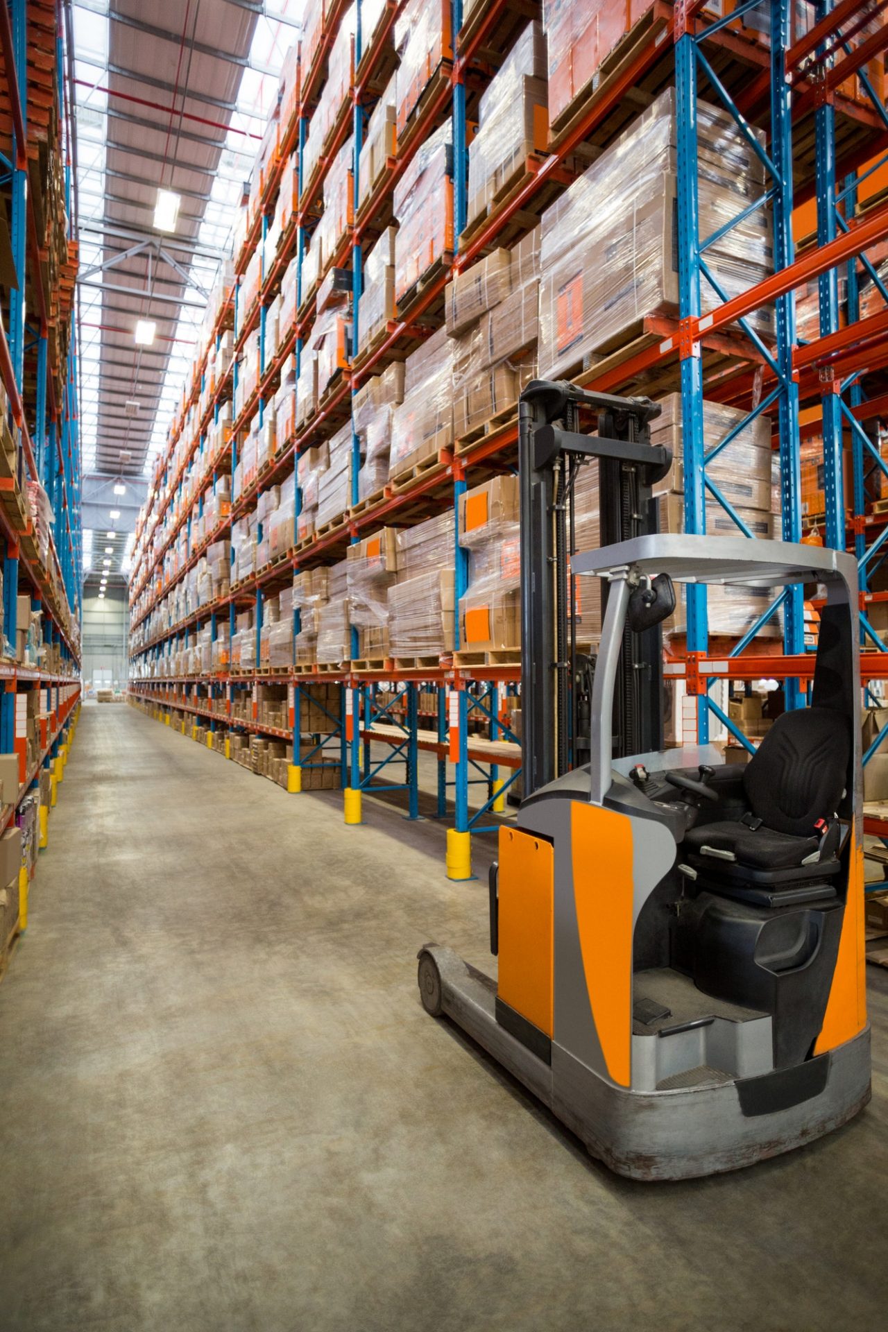 Forklift truck in warehouse